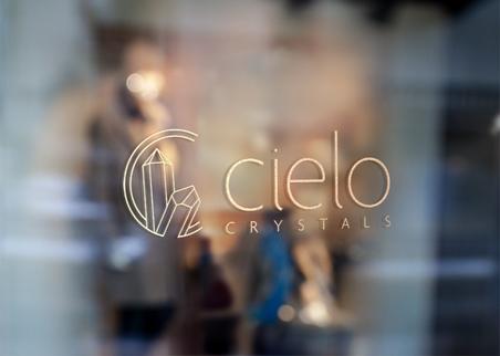 Cielo logo in gold on window